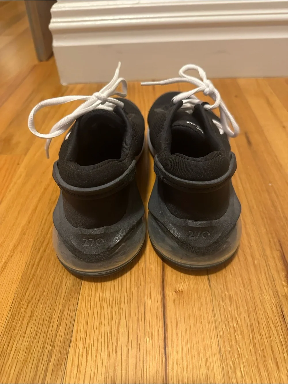 Nike women’s Black and White Sneakers